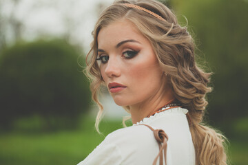 Naklejka premium Closeup portrait of nice young model with blonde hair