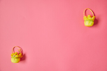 Easter chicks on the pink background. Happy Easter. Holiday concept.