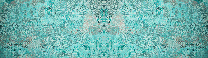 Old turquoise aquamarine vintage worn shabby patchwork ornate motif tiles stone concrete cement wall texture background banner
