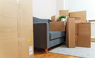 Fototapeta premium Cardboard boxes in room. Real estate and moving concept.