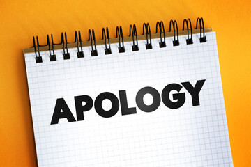 Apology text quote on notepad, concept background