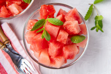 Top view of juicy watermelon pieces in glass bowl