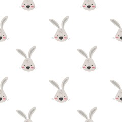 Hand drawn seamless pattern with cute bunny. Design concept for Easter print, packaging, wrapping paper, card, banner, invite. Flat style vector illustration.