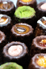Caneles de bordeaux is a small pastry with rum and vanilla, traditional French sweet dessert.