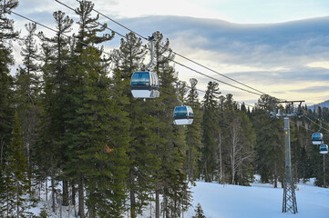 Chairlift for skiers on a rope
