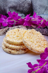 Сrispbread on a white wooden background