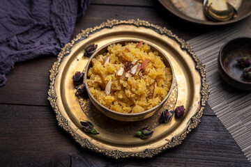 Moong Dal Halwa or Mung Daal Halva is an Indian traditional dessert, served in metal bowl