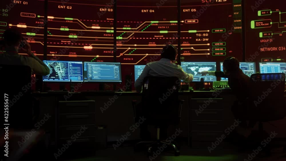 Poster Professional IT Technical Support Specialists and Software Developer Working on Computers in Monitoring Control Room with Digital Screens with Server Data, Blockchain Network and Surveillance Maps. 