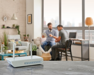 Modem and router box close up on the table style, decorative living room blue concept background.