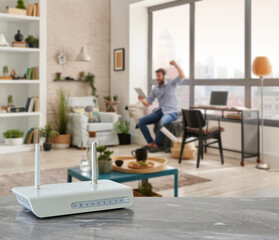 Modem and router box close up on the table style, decorative living room blue concept background.