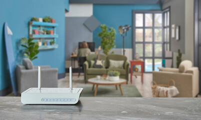 Modem and router box close up on the table style, decorative living room blue concept background.