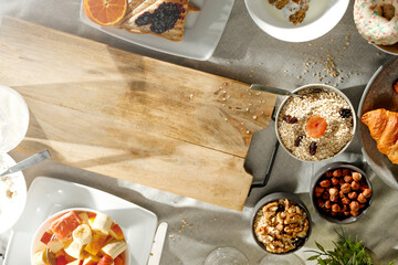 Spring breakfast on a wooden table in a mountain hut in the morning 