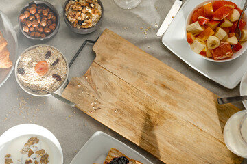 Spring breakfast on a wooden table in a mountain hut in the morning 