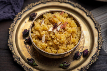 Moong Dal Halwa or Mung Daal Halva is an Indian traditional dessert, served in metal bowl