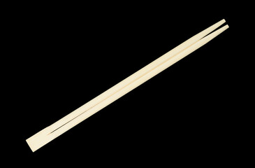 chopsticks for sushi on black background
