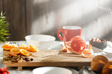 Spring breakfast on a wooden table in a mountain hut in the morning 