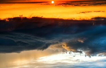 Fototapeta premium sunset in rural areas, bright sky with clouds . dramatic sky