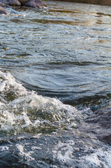 Rough mountain river stream, colorful nature, outdoor environment, small rapids, fast stream