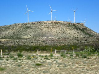 Desert landscape and wind farm