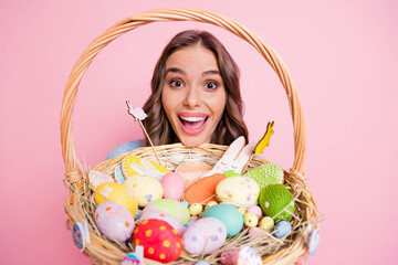 Photo of excited crazy lady open mouth demonstrate easter basket wear blue sweater isolated pink background