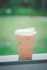 Iced coffee mocha in plastic glass with new lid design for don't use drink straw