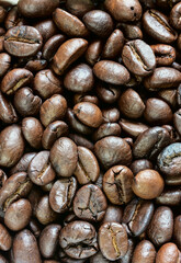Close up of roast coffee beans heap