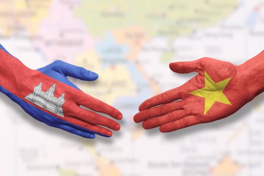 Vietnam and Cambodia - Flag handshake symbolizing partnership and cooperation