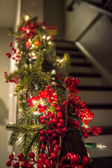 Fototapeta na wymiar Christmas berry stair rail decoration