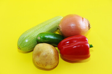 fresh natural vegetables cucumber, zucchini, potatoes, onions