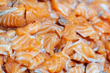 Close up pile of Fresh raw salmon fillets, thai street food market