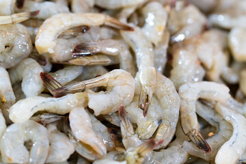 Close up pile of fresh Raw peeled Shrimps prawn, thai street food market