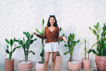Optimistic Asian woman with smartphone © BullRun