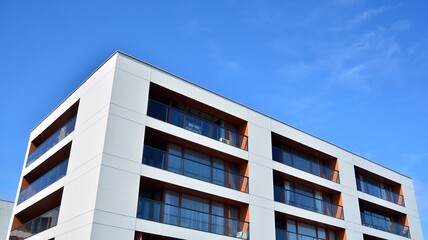 Part of city real estate property and condo architecture. Detail in modern residential flat apartment building exterior. Fragment of New luxury house and home complex. 