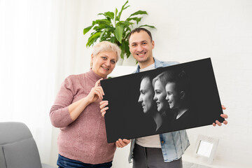 Classic portrait of young beautiful happy family in elegant clothes with little child. photo canvas