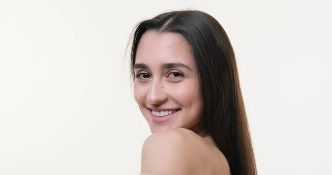 Face of woman smiling over white background
