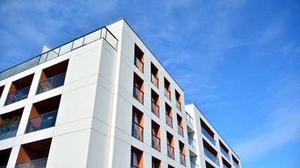 Part of city real estate property and condo architecture. Detail in modern residential flat apartment building exterior. Fragment of New luxury house and home complex. 