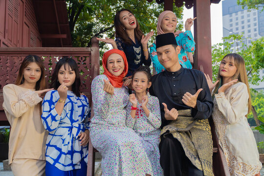 A Group Of Malay People Celebrating Hari Raya Festive