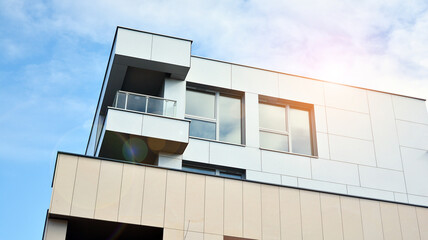Obraz premium Part of city real estate property and condo architecture. Detail in modern residential flat apartment building exterior. Fragment of New luxury house and home complex. 