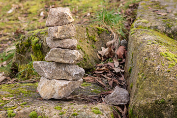 stone arrangement in mossy forest. Stones in balance