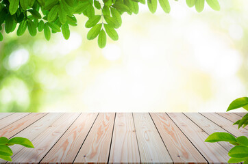 Empty wooden table with garden bokeh background with a country outdoor theme, Template mock up for...