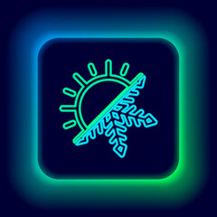 Glowing neon line Hot and cold symbol. Sun and snowflake icon isolated on black background. Winter and summer symbol. Colorful outline concept. Vector