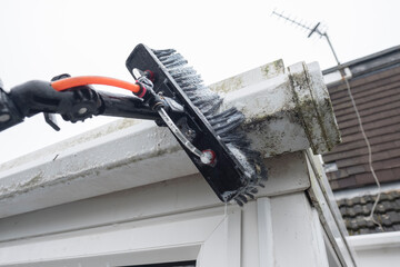 Cleaned white plastic pvc gutters and drain pipes that were blocked and full of green mould on the...