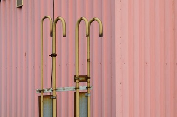 Detail of venting a gas pipe on the roof of a factory.