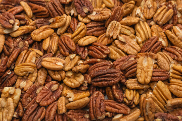 Tasty pecan-nut background. Top view.