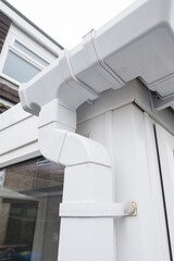 Cleaned white plastic pvc gutters and drain pipes that were blocked and full of green mould on the...