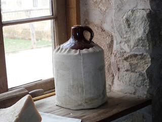 Old jug with a cover
