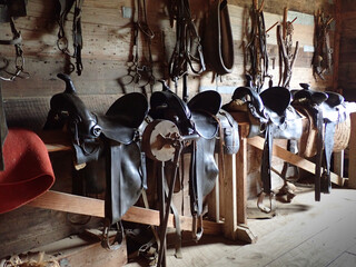 Saddles in a barn