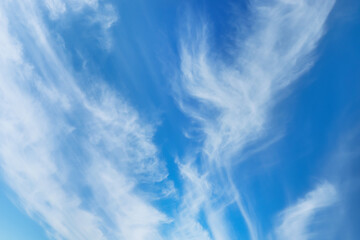 Beautiful fluffy white clouds in blue sky