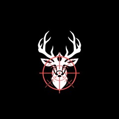 Icon of deer silhouette with target isolated on dark background