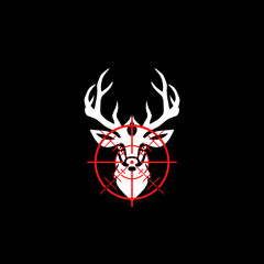 Icon of deer silhouette with target isolated on dark background